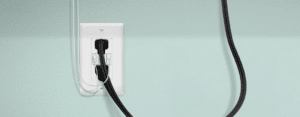 a top greener usb receptacle with several devices plugged into it