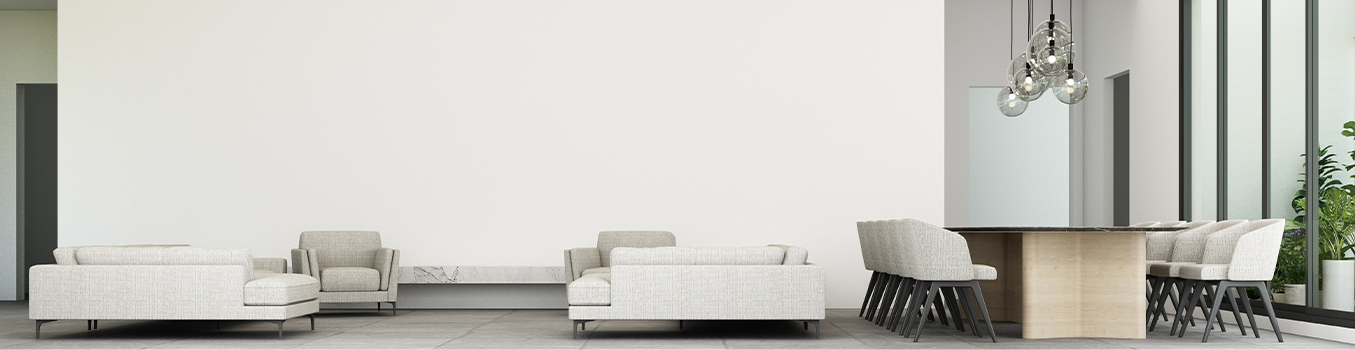 A very minimal arrangement of couches and chairs all with gray accent 